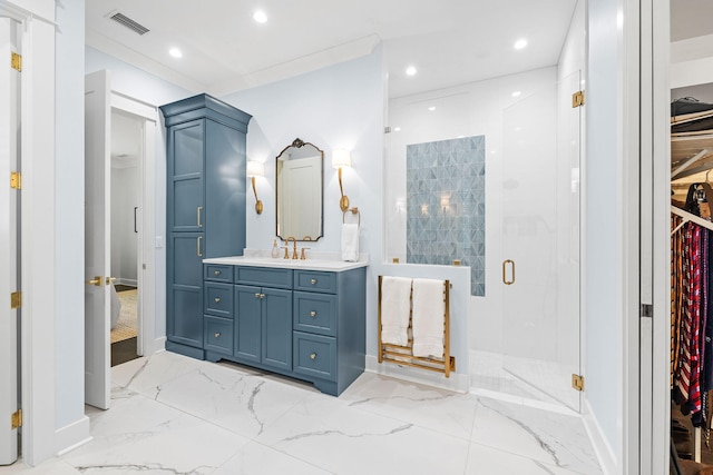 bathroom featuring a stall shower, visible vents, marble finish floor, a spacious closet, and vanity