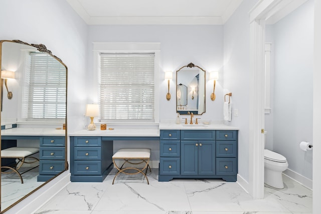 full bathroom featuring baseboards, toilet, ornamental molding, marble finish floor, and vanity