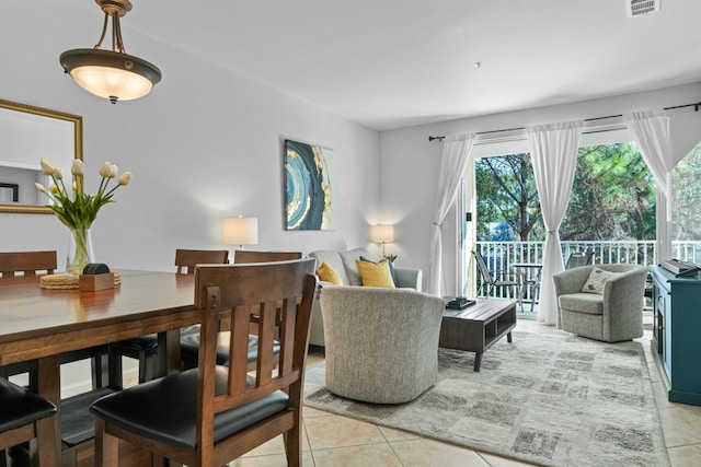 dining room with light tile patterned flooring and visible vents