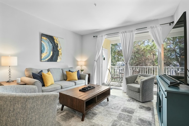 living area featuring light tile patterned flooring