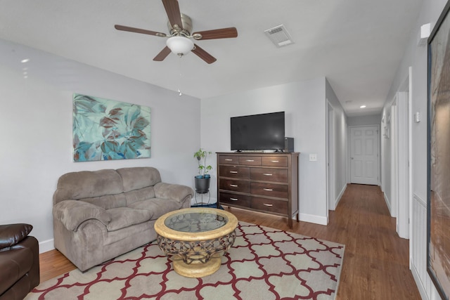 79 N 6th St, Santa Rosa Beach, FL 32459 - living area featuring a ceiling fan, visible vents, baseboards, and wood finished floors