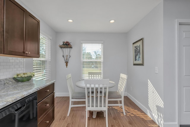 79 N 6th St, Santa Rosa Beach, FL 32459 - dining space with light wood-style floors, baseboards, and recessed lighting