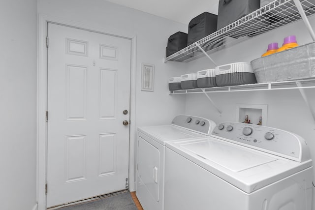 79 N 6th St, Santa Rosa Beach, FL 32459 - clothes washing area featuring washing machine and dryer and laundry area