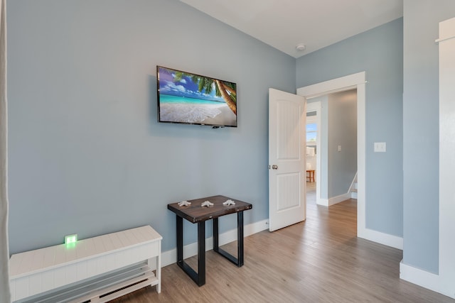 3625 Cape San Blas Rd, Cape San Blas, FL 32456 - hall with stairway, light wood-style flooring, and baseboards