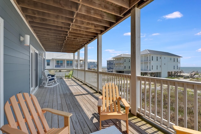 3625 Cape San Blas Rd, Cape San Blas, FL 32456 - wooden terrace with a residential view and a water view