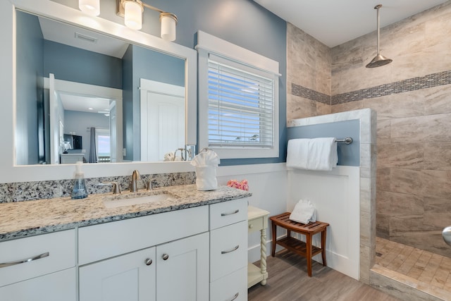 3625 Cape San Blas Rd, Cape San Blas, FL 32456 - full bath featuring visible vents, a walk in shower, vanity, and wood finished floors