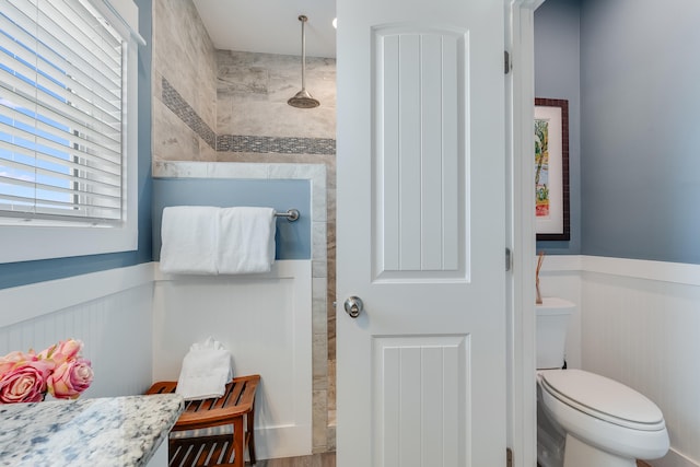 3625 Cape San Blas Rd, Cape San Blas, FL 32456 - full bathroom featuring toilet, walk in shower, and wainscoting