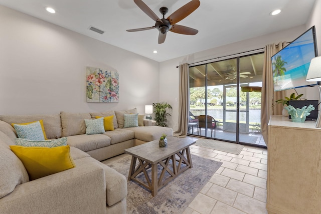 living room featuring ceiling fan, light tile patterned flooring, visible vents, and recessed lighting