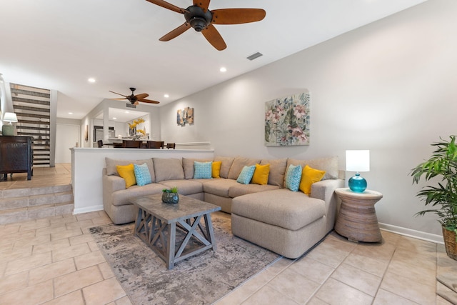 living area featuring light tile patterned flooring, recessed lighting, a ceiling fan, baseboards, and visible vents