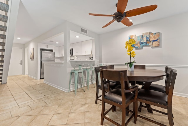 dining room featuring recessed lighting, visible vents, stairway, and light tile patterned flooring