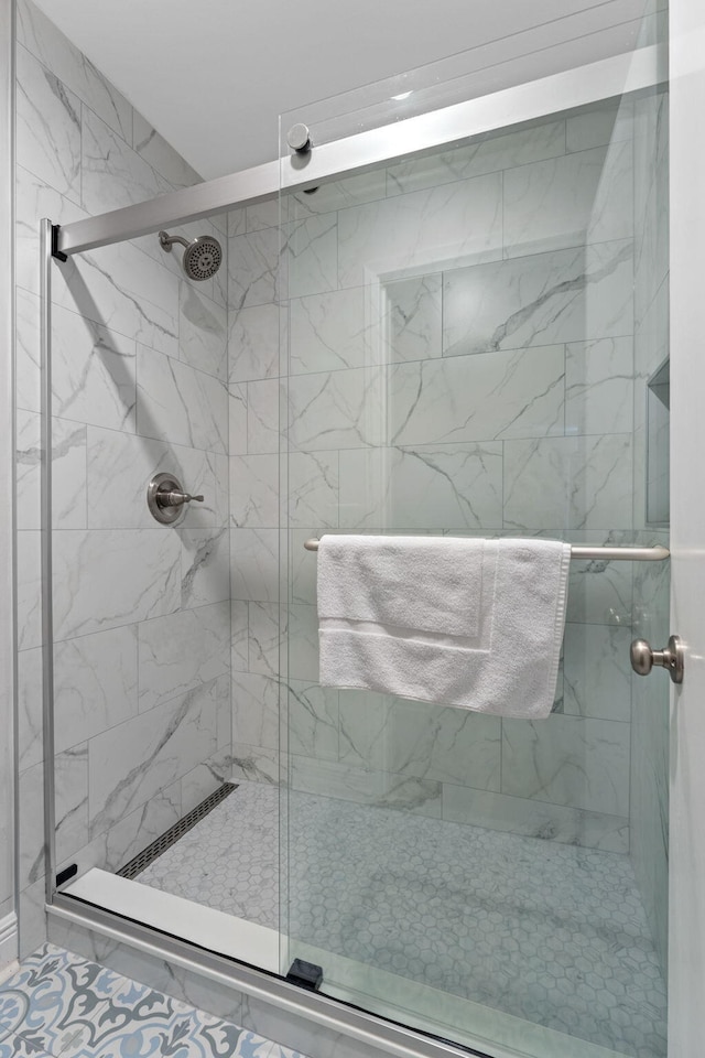 full bathroom with a shower stall