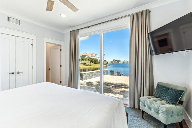 bedroom featuring access to exterior, crown molding, a closet, visible vents, and a ceiling fan