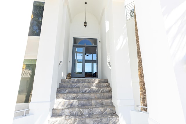 stairway with a high ceiling