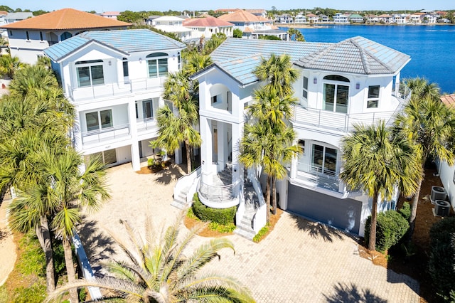 birds eye view of property with a residential view and a water view