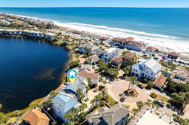 bird's eye view featuring a residential view, a water view, and a beach view