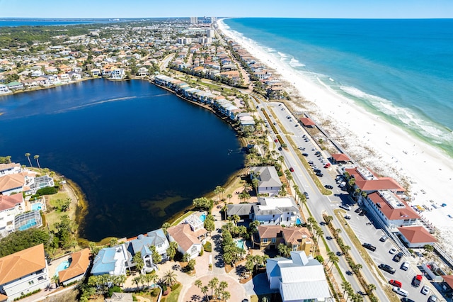 aerial view featuring a water view and a beach view