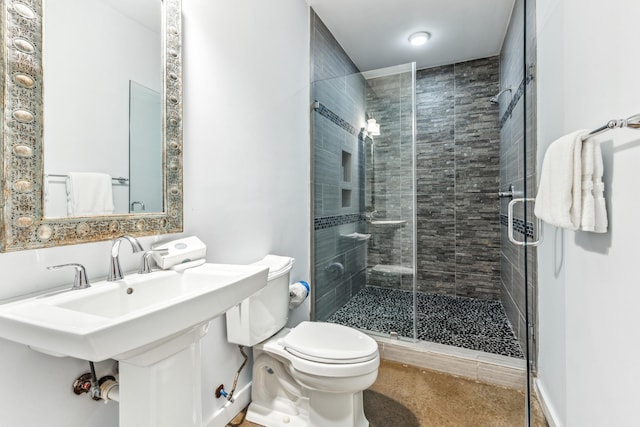 full bath featuring a shower stall and toilet