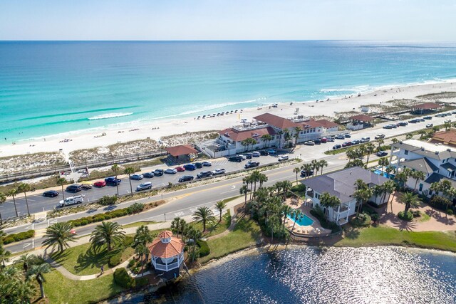 bird's eye view featuring a water view and a view of the beach