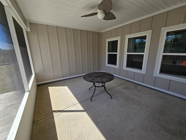 exterior space featuring a ceiling fan