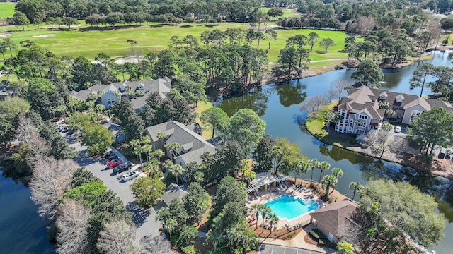 aerial view featuring a residential view, view of golf course, and a water view