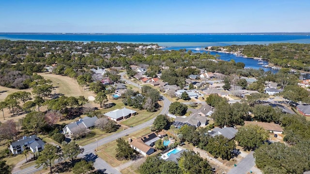 bird's eye view with a water view and a residential view