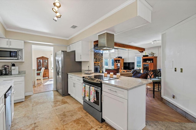 kitchen with island range hood, a peninsula, visible vents, white cabinets, and appliances with stainless steel finishes