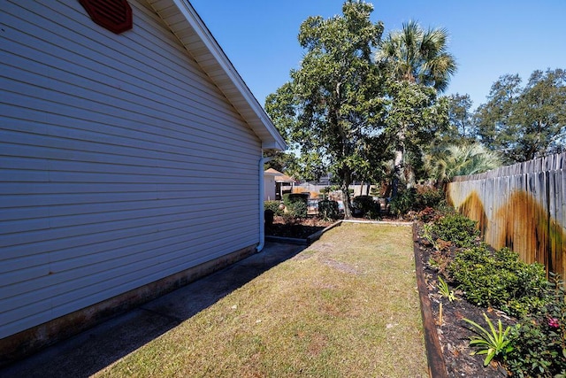 view of yard featuring fence