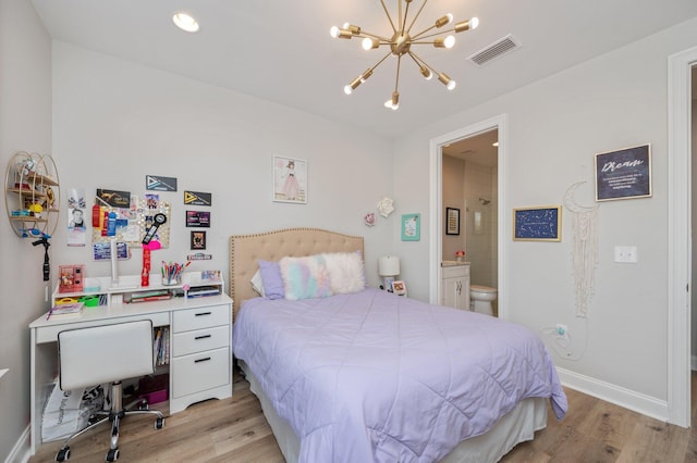 bedroom with light wood-type flooring, baseboards, visible vents, and a notable chandelier