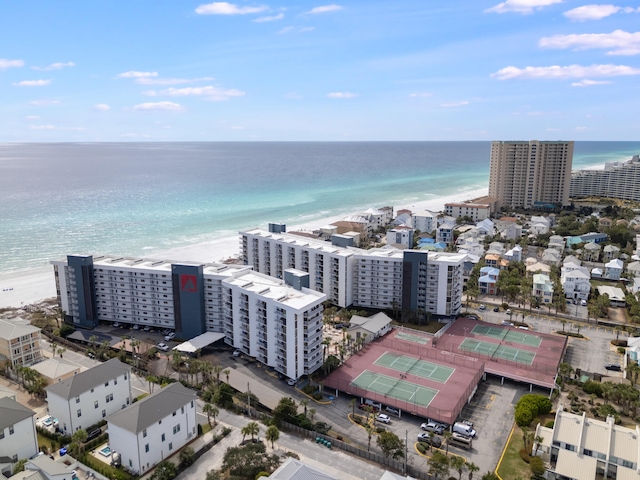 birds eye view of property featuring a water view and a city view