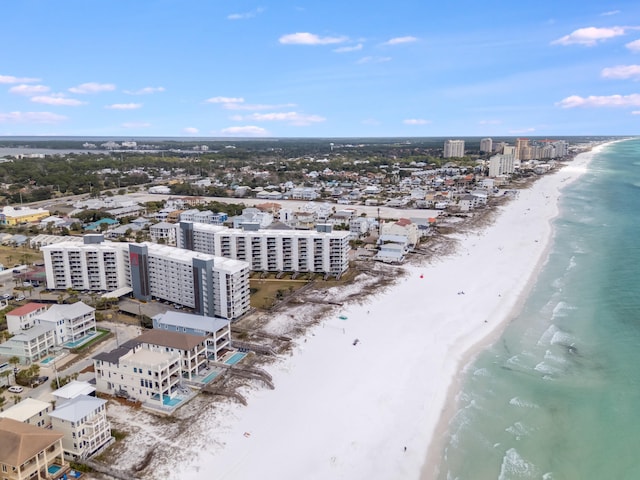 birds eye view of property with a view of city, a water view, and a view of the beach