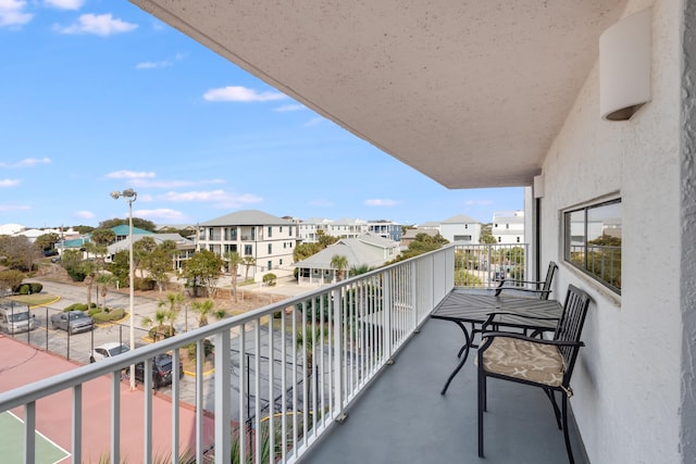 balcony featuring a residential view