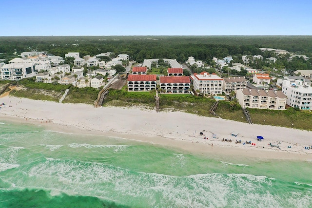 bird's eye view with a view of the beach and a water view