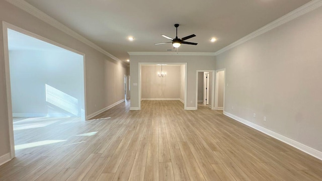 2720 Louis Cir, Crestview, FL 32536 - unfurnished living room with crown molding, light wood-type flooring, baseboards, and ceiling fan with notable chandelier