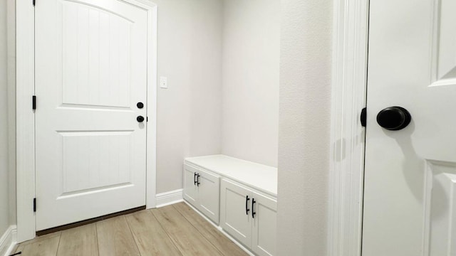 2720 Louis Cir, Crestview, FL 32536 - mudroom featuring baseboards and light wood-style floors
