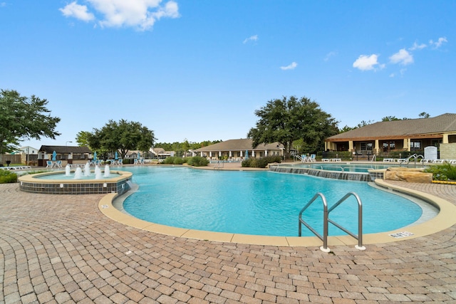 232 Brighton Cv, Freeport, FL 32439 - community pool with a patio