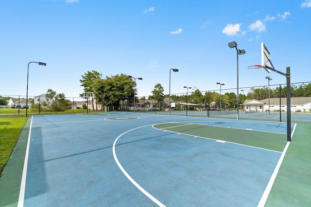 232 Brighton Cv, Freeport, FL 32439 - view of basketball court featuring a tennis court, community basketball court, and fence