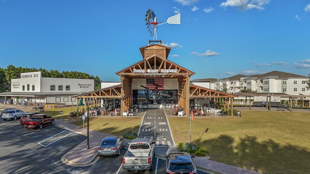 232 Brighton Cv, Freeport, FL 32439 - view of building exterior with uncovered parking