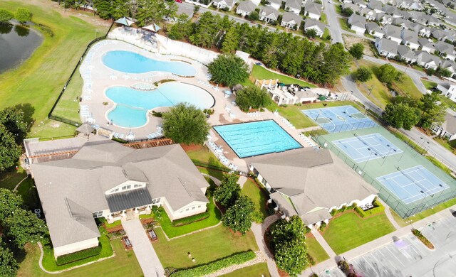 232 Brighton Cv, Freeport, FL 32439 - aerial view of residential area featuring a pool