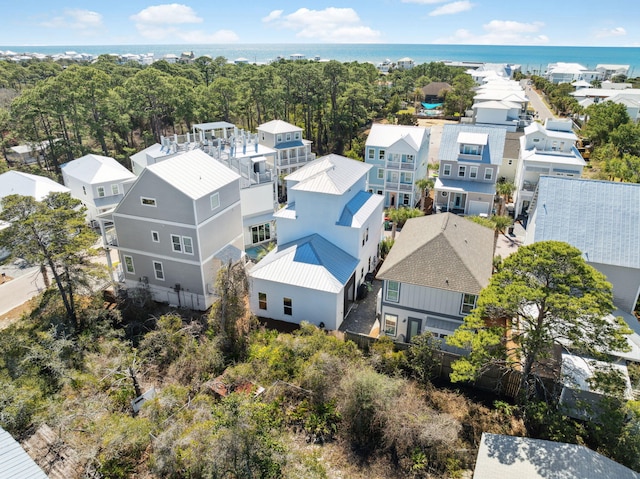 aerial view featuring a residential view and a water view