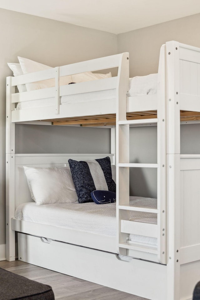 bedroom featuring wood finished floors