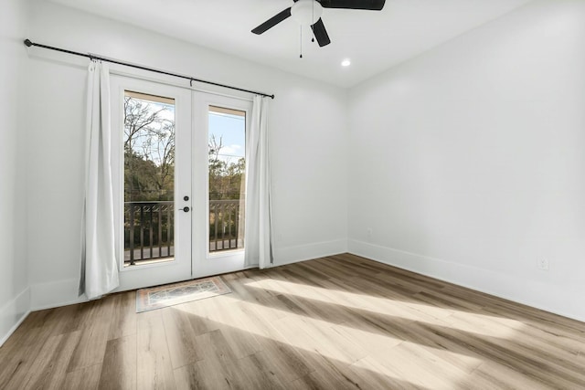 entryway with baseboards, a ceiling fan, wood finished floors, french doors, and recessed lighting