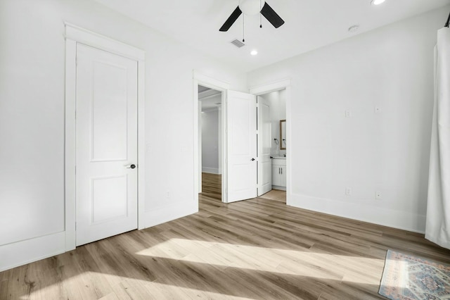 unfurnished bedroom featuring recessed lighting, baseboards, visible vents, and light wood finished floors