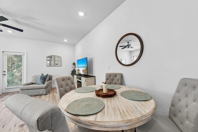 dining room featuring a textured ceiling, recessed lighting, a ceiling fan, and light wood-style floors