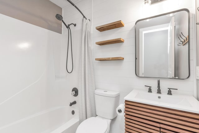 full bathroom featuring vanity, toilet, and shower / tub combo with curtain