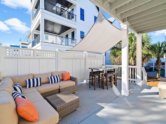 view of patio / terrace with outdoor dining space, outdoor lounge area, and a fenced backyard