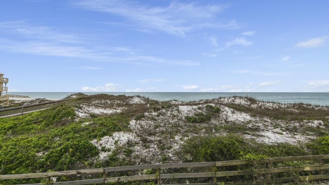 view of water feature with fence