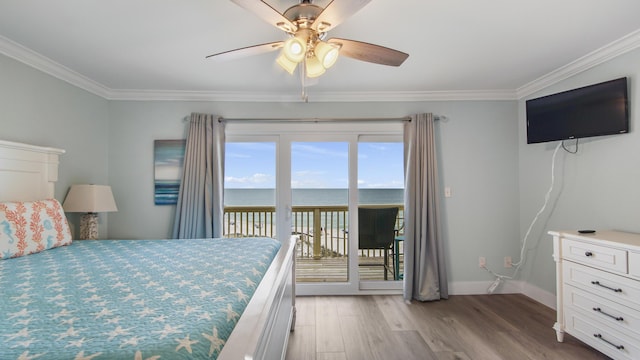 bedroom featuring access to outside, crown molding, light wood-style flooring, and baseboards