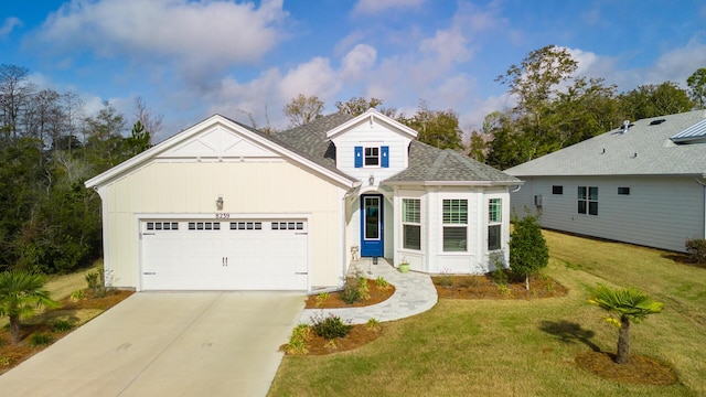 view of front of home featuring a shingled roof, concrete driveway, board and batten siding, a garage, and a front lawn