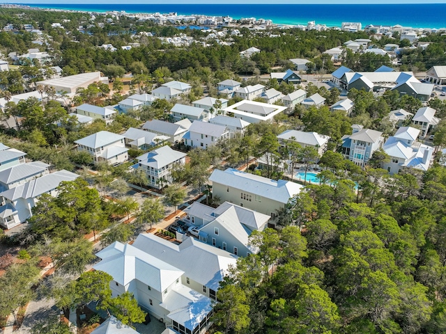 aerial view featuring a residential view and a water view