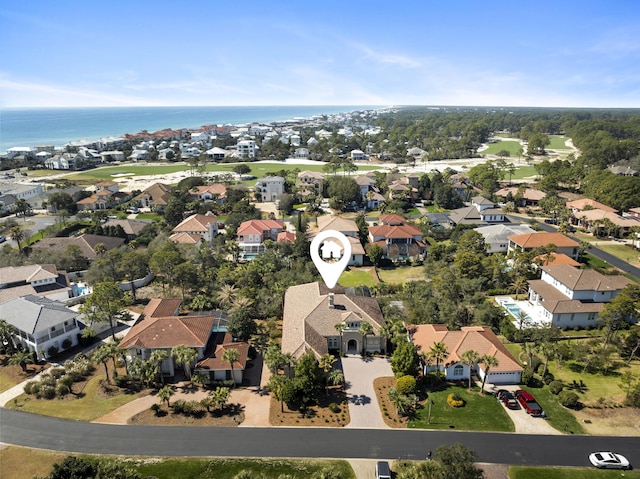 aerial view featuring a residential view and a water view